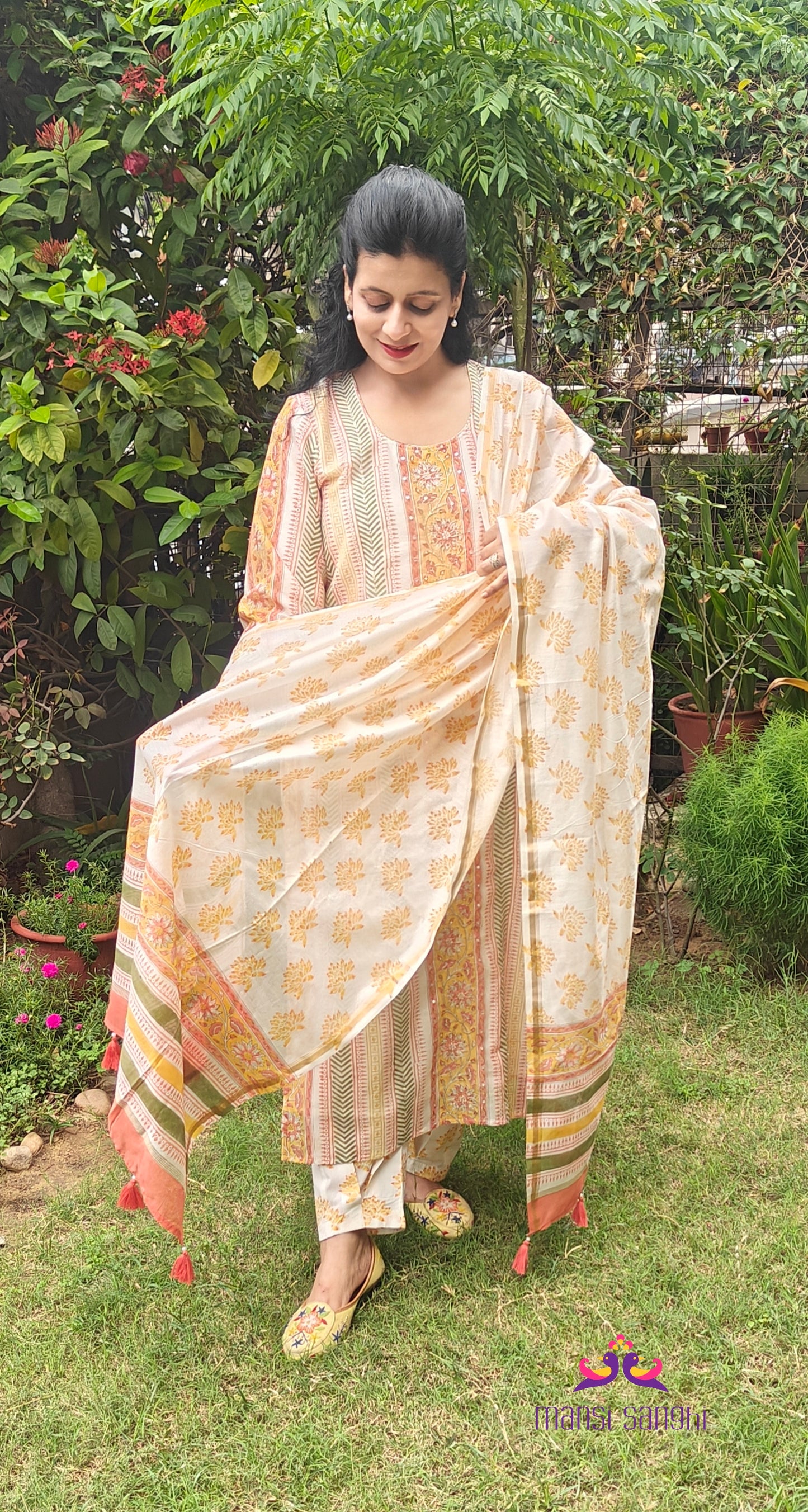 Sunehri yellow and orange hand block printed Chanderi suit with hand Ari embroidery